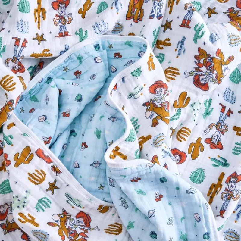 aden__anais__essentials_c_SKUtYX2dvTx_5.webp Aden + Anais - Essentials Cotton Muslin Blanket Toy Story, Woody & Friends Clearance