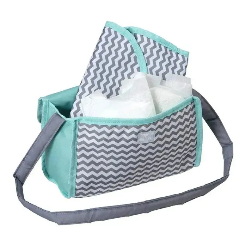 adora__bolsa_de_fraldas_p_SKU1peCT2Fj_1.webp Adora - Bolsa de fraldas para boneca, inclui trocador e 2 fraldas para boneca, estampa em zigue-zague Hot