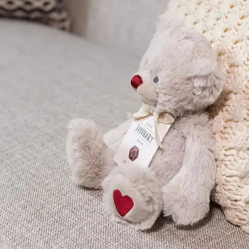 demdaco__urso_de_pelcia_d_SKUI4YRL44M_1.webp Demdaco - Urso de pelúcia de janeiro Birthstone Hot
