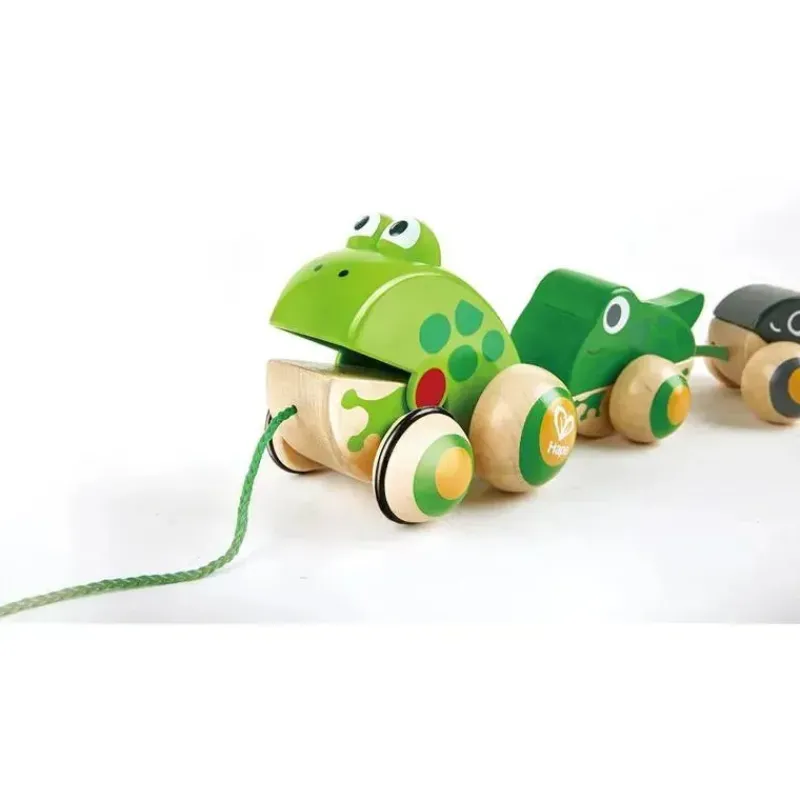 hape__famlia_pull_along_f_SKUaX8aeDVm_1.webp Hape - Família Pull Along Frog com rodas anti-capotamento Best