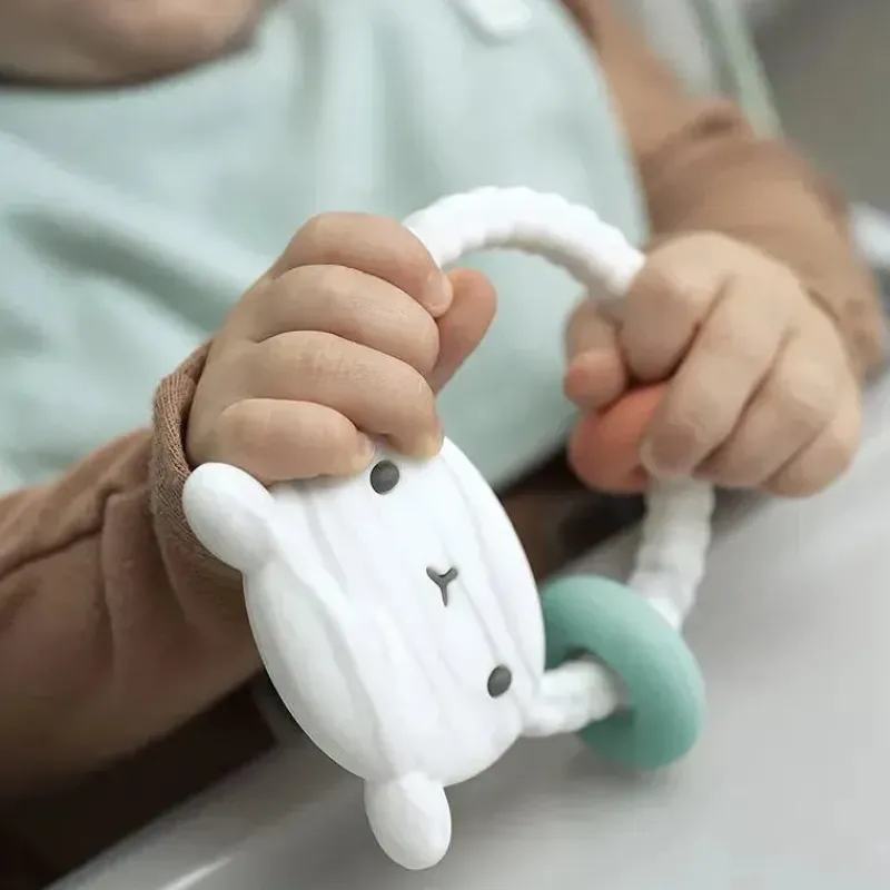 ingenuity__brinquedo_calm_SKUwbu3LB5s_1.webp Ingenuity - Brinquedo calmante para mordedor de bebê Sheppy com anéis de atividade Online