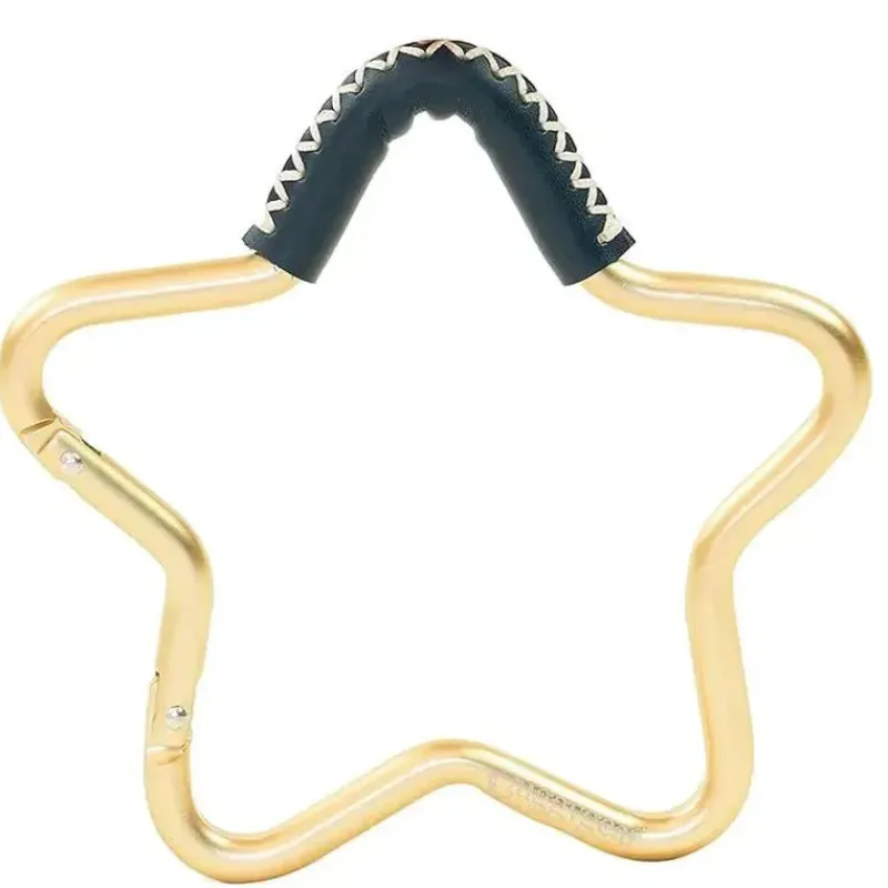 kidco__buggy_gear_star_ho_SKU1LZCA8sG_0.webp Kidco - Buggy Gear Star Hook da BUGGYGEAR Ouro/Couro Marinho Clearance