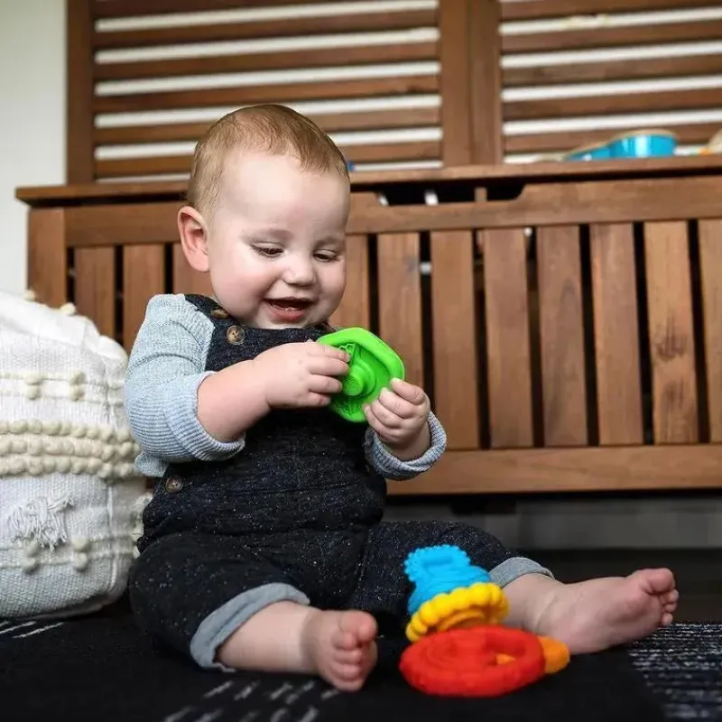 kids_ii__brinquedo_morded_SKUFZzZQYzN_1.webp Baby Einstein Kids II - Brinquedo mordedor multitexturizado Stack & Teethe Outlet
