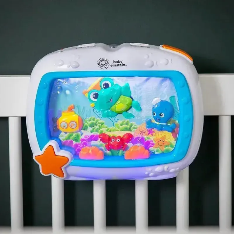 kids_ii__brinquedo_para_b_SKUKLvlRzN8_1.webp Baby Einstein Kids II - Brinquedo para berço com chupeta Sea Dreams New