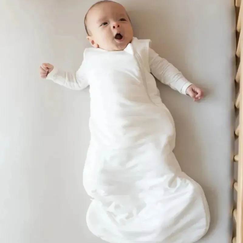 kyte_baby__saco_de_dormir_SKUtCSNQW1j_0.webp Kyte Baby - Saco de dormir original de bambu para bebês em nuvem 0,5 New