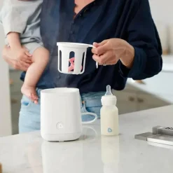 Munchkin - Aquecedor e esterilizador rápido de mamadeiras, preserva nutrientes Hot
