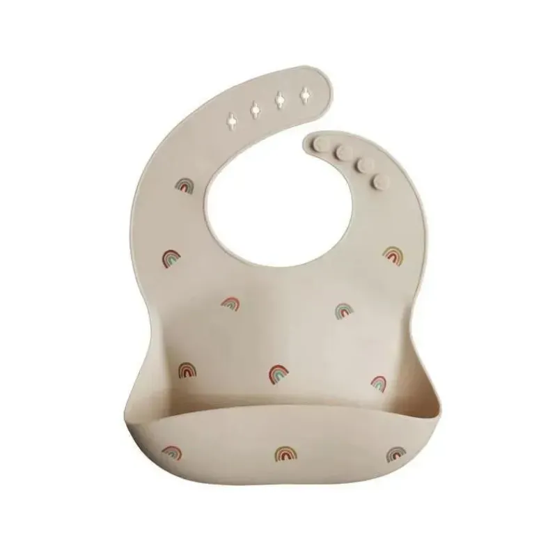 mushie__babete_de_beb_de__SKUos7BjJhd_0.webp Mushie - Babete de bebê de silicone - Arco-íris Online