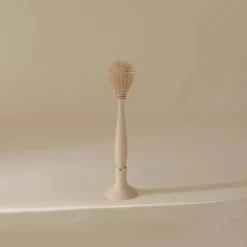 Mushie - Escova para mamadeira, silicone macio com base de sucção, areia móvel Fashion