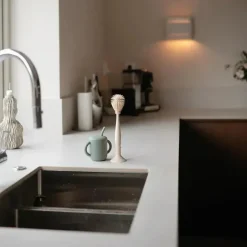 Mushie - Escova para mamadeira, silicone macio com base de sucção, areia móvel Fashion