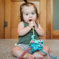Nuby - Brinquedo interativo polvo 100% silicone com cordão Best