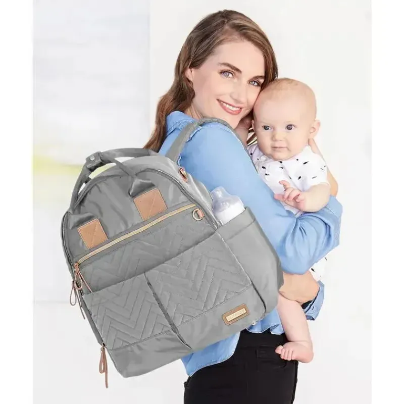 skip_hop__conjunto_de_moc_SKUxSqDf9dw_3.webp Skip Hop - Conjunto de mochila para fraldas Suite, Dove Online