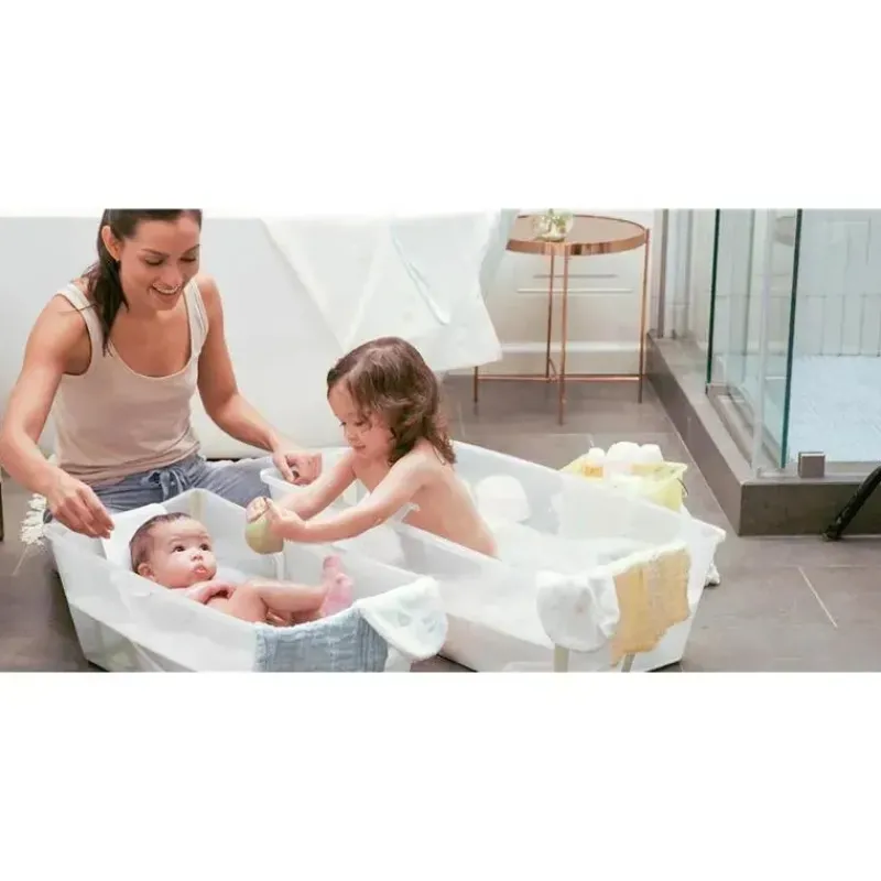 stokke__banho_flexi__conj_SKUZ62xmNwA_1.webp Stokke ® - Banho Flexi® | Conjunto de banheira dobrável para bebê, azul oceano Outlet