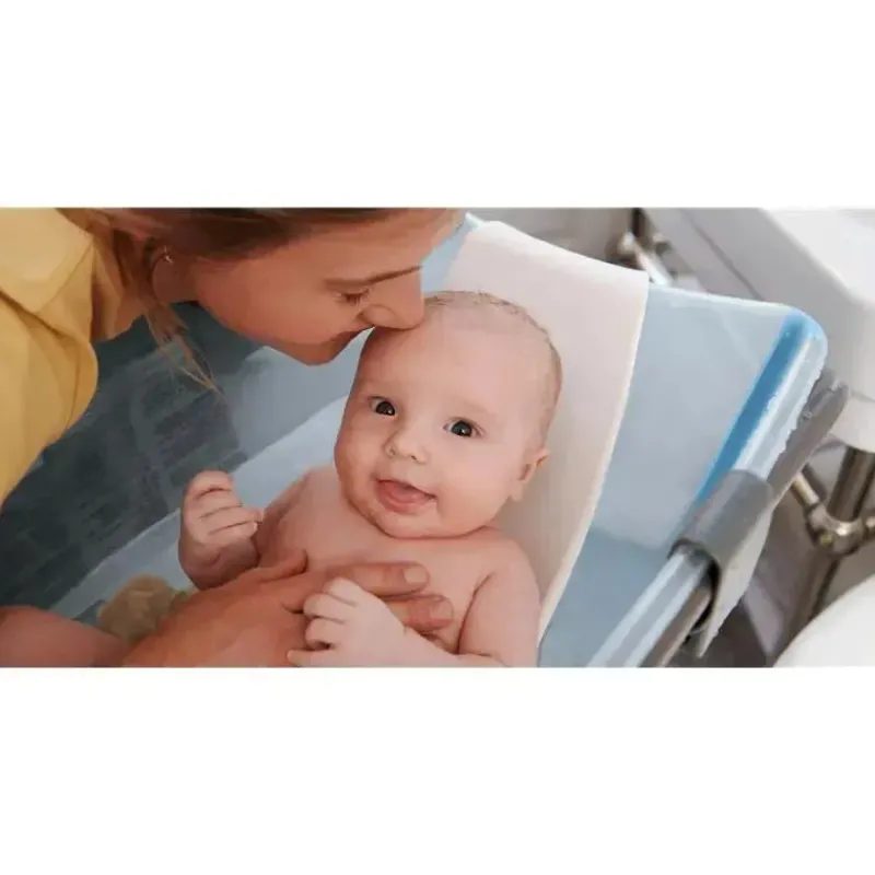 stokke__banho_flexi__conj_SKUZ62xmNwA_3.webp Stokke ® - Banho Flexi® | Conjunto de banheira dobrável para bebê, azul oceano Outlet