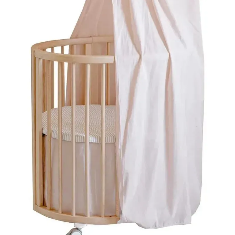 stokke__saia_para_mini_ca_SKUrrM7ewVc_0.webp Stokke - Saia para mini cama Sleepi da Pehr, Blush New