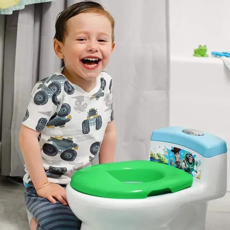 tomy__toy_story_em_potty__SKUsiimDW6X_3.webp Tomy - Toy Story 2-em-1 Potty System Fashion